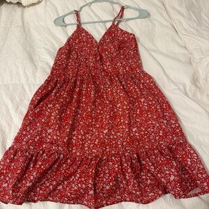 Red floral dress with adjustable straps and ruffles!